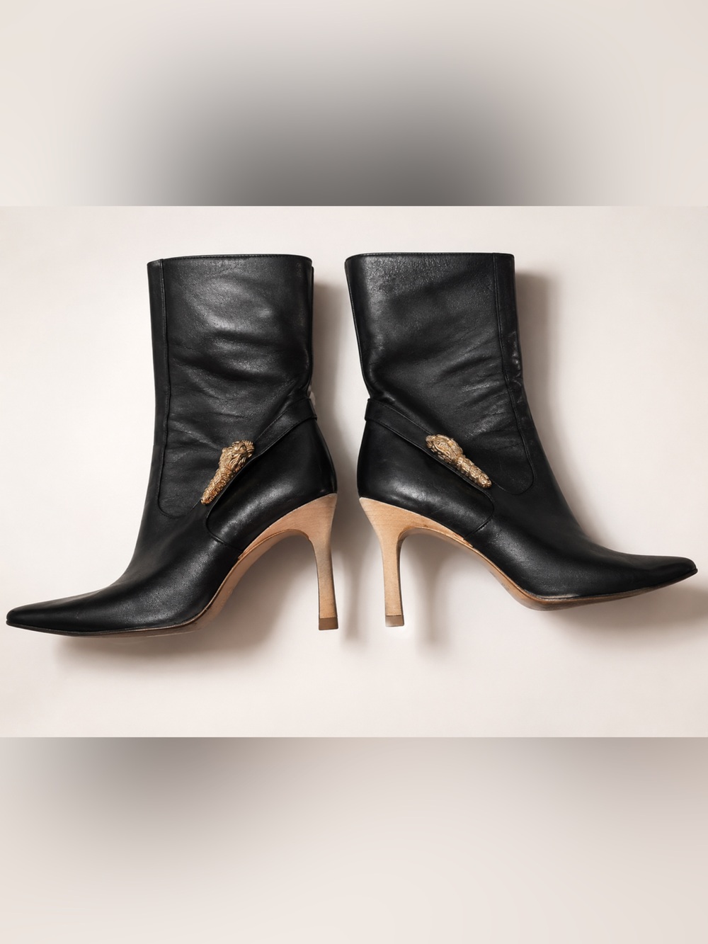 Gucci Black Leather Pointed-Toe Stiletto Ankle Boots with Gold Accent